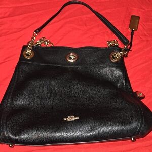 Coach Black and Gold Shoulder Bag with Sophisticated Charm